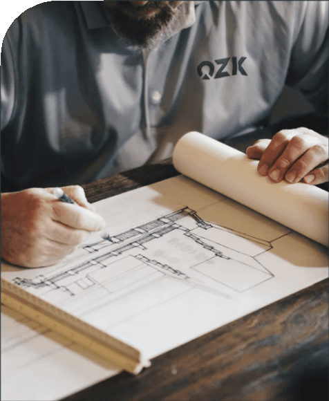Harvey-Fisher Construction professional sketching blueprints